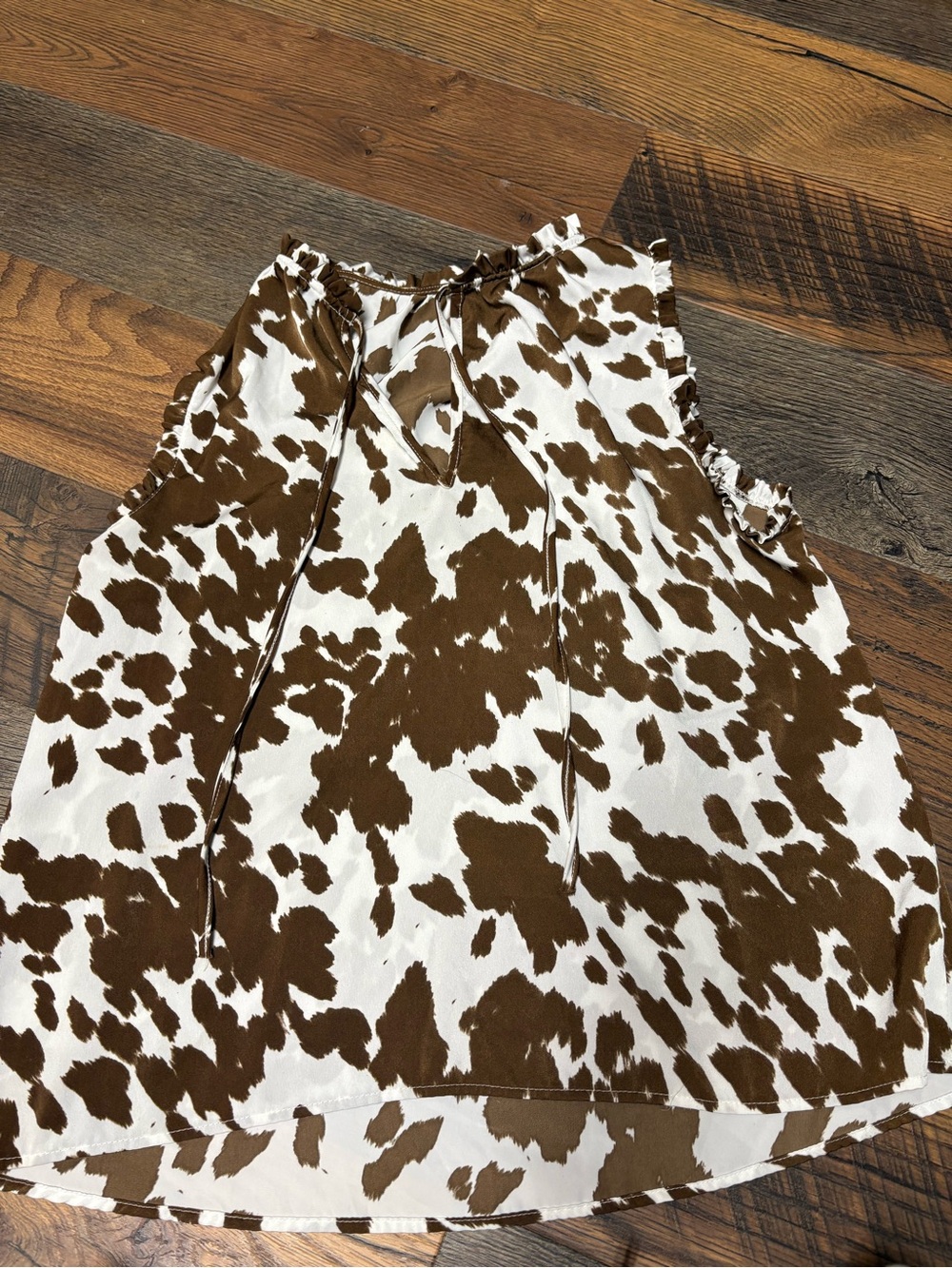 Tyche Brown and White Cow-Pattern Tie Neck Blouse